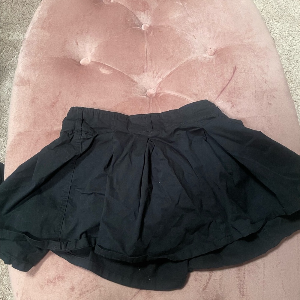 Black skirt shorts underneath